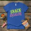 Snack Dealer t-shirt with bright yellow and pink text, surrounded by stars and snacks