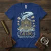 T-shirt with "Snow Is Falling Books Are Calling" text, featuring a snowy castle graphic and flying books