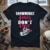 SNOWMOBILE Hair DON'T Care text with a graphic of a snowmobile in action on a black t-shirt