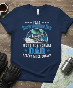 Navy t-shirt with "I'm a Snowmobiling Dad Just Like a Normal Dad Except Much Cooler" text and snowmobiler graphic under