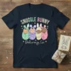 Snuggle Bunny Delivery Co. t-shirt design featuring four swaddled babies with bunny ears in pastel colors