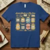 Blue t-shirt with "Social Studies is My Jam" text and jars labeled History, Geography, Civics, Government, Economics, Social Sciences, Humanities