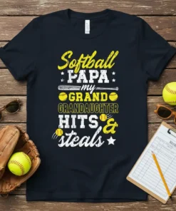 Softball Papa My Granddaughter Hits & Steals t-shirt design with yellow and white text, softball graphics, and baseball bat illustration