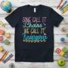Some Call It Chaos We Call It Kindergarten text design on a navy t-shirt, featuring colorful playful typography