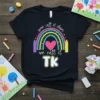 Black t-shirt with colorful rainbow design and text "some call it chaos we call it TK", featuring pencils and a