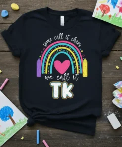Black t-shirt with colorful rainbow design and text "some call it chaos we call it TK", featuring pencils and a