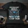 Hockey goalie t-shirt with text "Some Dream About Goals I Stop Them" and graphic of goalie mask, crossed sticks, and