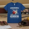 Blue t-shirt with white text: "SOME GRANDPAS TAKE NAPS REAL GRANDPAS GO BOWLING (THEN TAKE A NAP)" and bowling ball