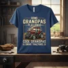 T-shirt featuring the quote "Some Grandpas Play Bingo, Cool Grandpas Drive Tractors" with a red tractor graphic and vintage sunburst