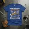 T-shirt with text "SOME GRANDPAS PLAY BINGO REAL GRANDPAS GO DRAG RACING" and a graphic of a vintage drag racing