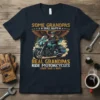 Some Grandpas Take Naps Real Grandpas Ride Motorcycles quote on a navy t-shirt with a vintage biker graphic and wings