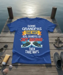 T-shirt with white text "SOME GRANDPAS TAKE NAPS" and "THEN TAKE NAPS" framing "REAL GRANDPAS GO JET SKIING" with graphics