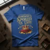Somebody's Spoiled Ol' Lady text with a crown and gold coins graphic on a blue t-shirt