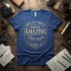 Blue t-shirt with gold text quote: "Once In A While Someone Amazing Comes Along And Here I Am"