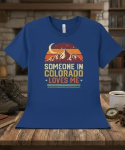 Someone in Colorado Loves Me T-Shirt with retro mountain sunset design and crescent moon graphic