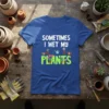 Sometimes I Wet My Plants funny gardening quote on a blue t-shirt with plant graphics