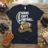 Sorry Can't Football Bye Game Day text with football graphics on a navy blue t-shirt