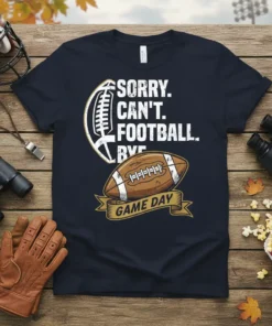 Sorry Can't Football Bye Game Day text with football graphics on a navy blue t-shirt
