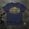 Navy blue t-shirt with distressed yellow text that reads "Sorry I Can't Hear You Over My Military Grade Tinnitus" and