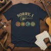 Sorry I Cant I Have Guitar T-Shirt featuring a vintage-style guitar and four circular graphics representing music and travel themes
