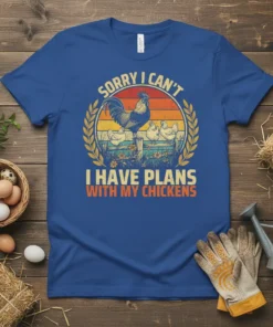 Sorry I Can't I Have Plans With My Chickens text with rooster and hens graphic on a blue t-shirt