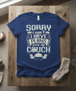 Sorry I Can't I Have Plans With My Couch T-Shirt design featuring bold text and sofa graphics