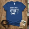 Sorry I Can't I Have Plans With My Dog text with running dog graphic on blue t-shirt