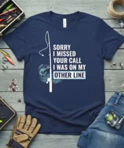 T-shirt with text "Sorry I Missed Your Call I Was On My Other Line" and a fishing rod with a