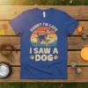 Sorry I'm Late I Saw A Dog text with a retro sunset and dog graphic on a blue t-shirt