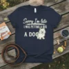 Navy t-shirt with "Sorry I'm late I WAS PETTING A DOG" text and a cartoon dog graphic
