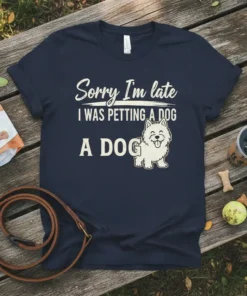 Navy t-shirt with "Sorry I'm late I WAS PETTING A DOG" text and a cartoon dog graphic