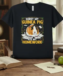 Sorry My Guinea Pig Ate My Homework quote on a black t-shirt with a cute guinea pig graphic