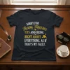 Black t-shirt with bold gold and white text: "SORRY FOR HAVING FABULOUS TITS AND BEING RIGHT ABOUT EVERYTHING. AS IF