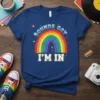 Sounds Gay I'm In text with a colorful rainbow graphic on a blue t-shirt, celebrating LGBTQ pride