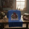 Spartan T-Shirt featuring a red and gold Spartan helmet with laurel wreath and the word SPARTAN in distressed white text