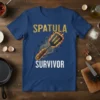 Spatula Survivor t-shirt design with a flaming spatula graphic and bold text for grill masters and chefs