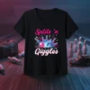 Splits 'n Giggles text with a cartoon bowling ball and pins graphic on a black t-shirt