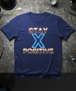 STAY X POSITIVE text graphic with a neon blue X on a navy t-shirt, motivational design