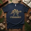 Stegasaurus skeleton graphic on a navy blue t-shirt with the word STEGASARUS below it