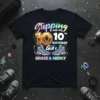 Black t-shirt with "Stepping Into My 10th Birthday with God's Grace & Mercy" text and colorful sneakers graphic
