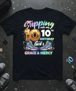 Black t-shirt with "Stepping Into My 10th Birthday with God's Grace & Mercy" text and colorful sneakers graphic