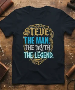 Steve The Man The Myth The Legend quote on a black t-shirt with gold and blue typography, framed by ornate