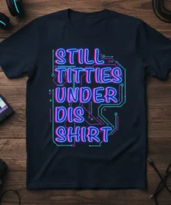 STILL TITTIES UNDER DIS SHIRT text in retro neon blue and pink on a dark t-shirt