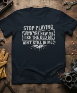 "Stop Playing With The New Me Like The Old Me Ain't Still In Me" quote on a dark t-shirt with