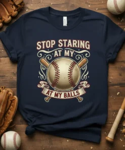 Funny baseball t-shirt design with text "STOP STARING AT MY AT MY BALLS" and a baseball graphic with bats