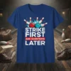 Strike First Ask Questions Later bowling quote t-shirt with red and blue bowling balls and pins graphic