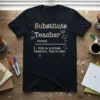 Substitute Teacher definition t-shirt in black, featuring colorful text that reads "Substitute Teacher (noun) 1. like a normal teacher, but