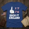 Suck It England 1776 patriotic t-shirt design with a middle finger graphic and American flag accents