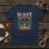 Sukot The Original Camping Festival t-shirt design featuring a campfire, tents, and pine trees under a starry night sky
