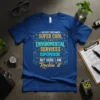 Blue t-shirt with the quote "I NEVER DREAMED SUPER COOL ENVIROMENTAL SERVICES SUPERVISOR BUT HERE I AM Rockin' it" in